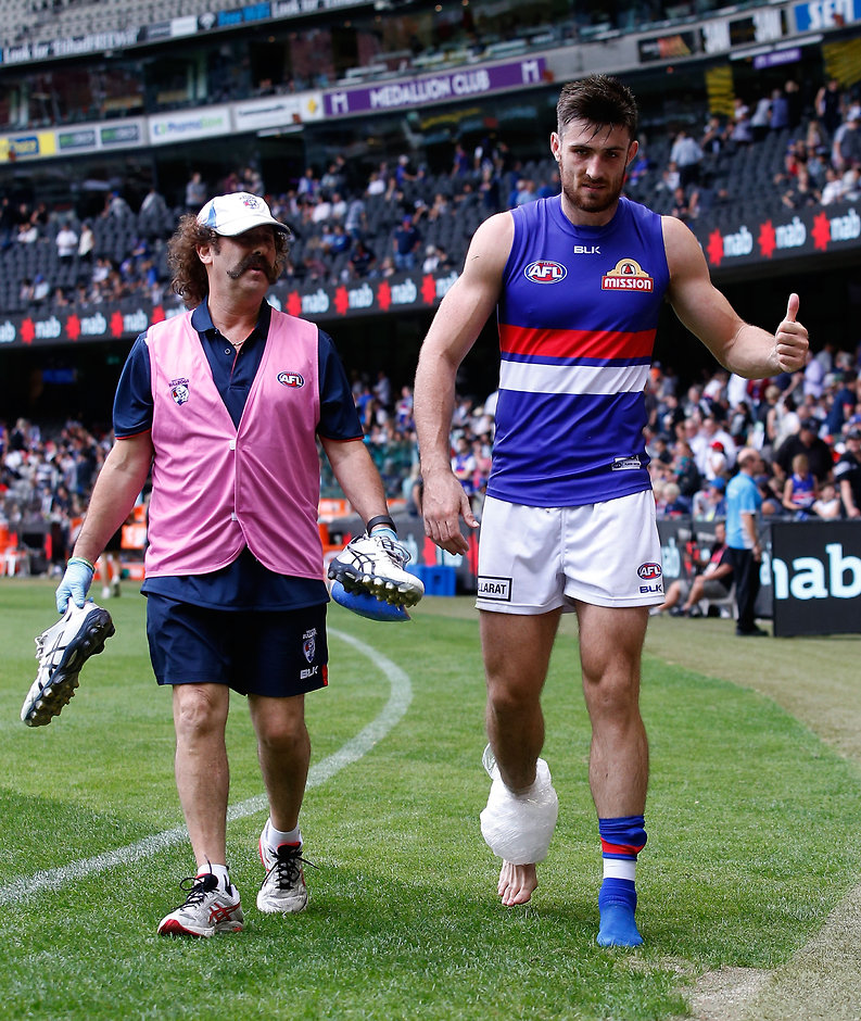 AFL 2016 NAB Challenge - Collingwood v Western Bulldogs Tom Campbell after injuring his ankle in the NAB Challenge - ${keywords}